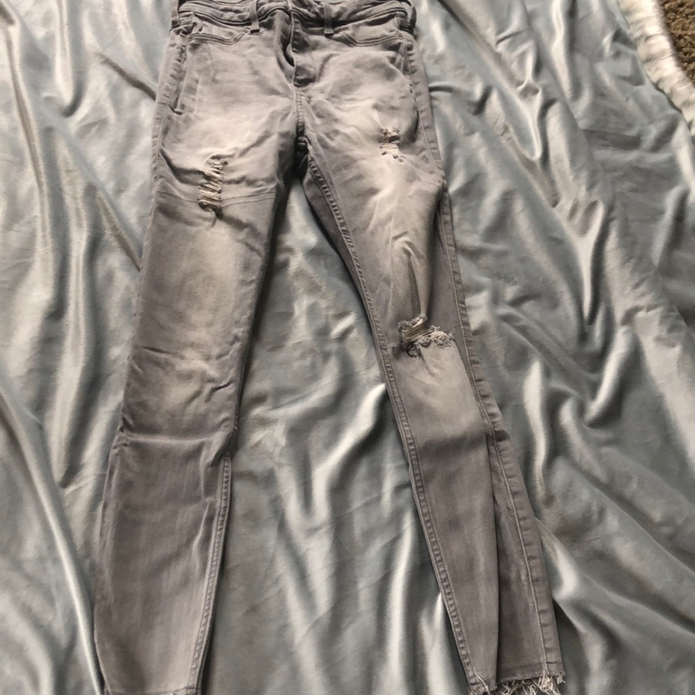 ripped grey jeans
